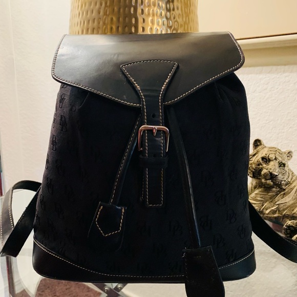 Dooney & Bourke Handbags - Vintage Dooney & Bourke Black Leather Sling Bucket Backpack Bag with tassels